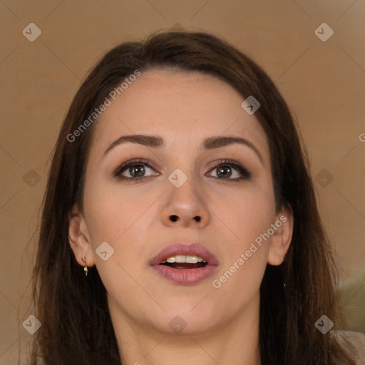 Joyful white young-adult female with long  brown hair and brown eyes