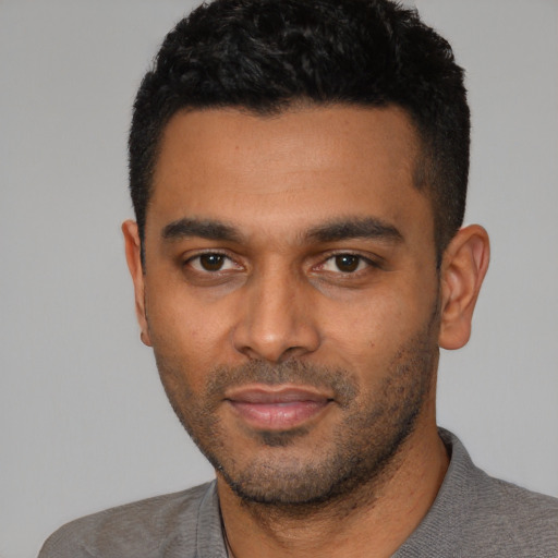 Neutral latino young-adult male with short  black hair and brown eyes
