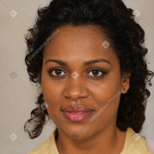 Joyful black young-adult female with medium  brown hair and brown eyes