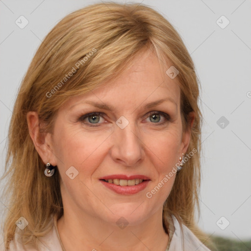 Joyful white adult female with medium  brown hair and blue eyes