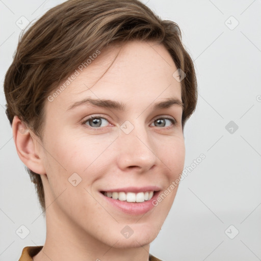 Joyful white young-adult female with short  brown hair and grey eyes