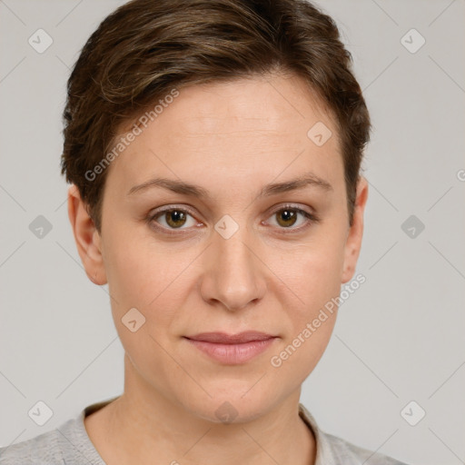 Joyful white young-adult female with short  brown hair and grey eyes