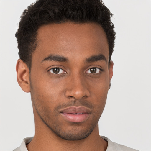 Neutral black young-adult male with short  brown hair and brown eyes