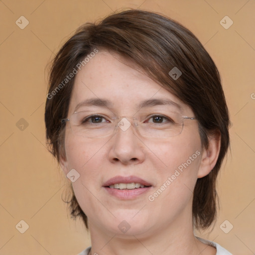 Joyful white adult female with medium  brown hair and brown eyes