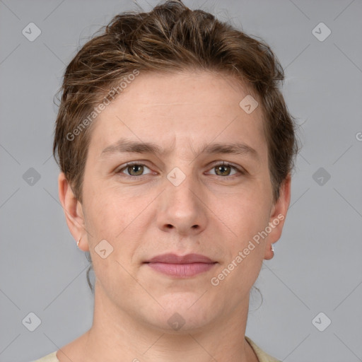 Joyful white adult male with short  brown hair and grey eyes