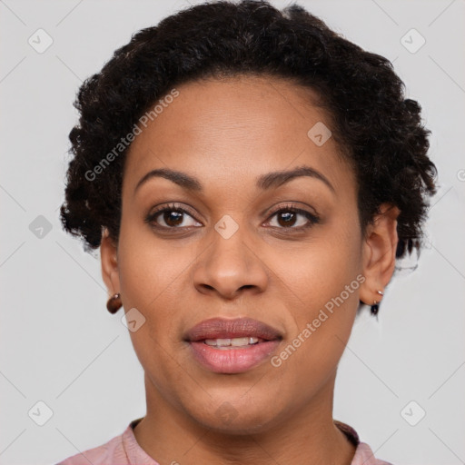 Joyful black young-adult female with short  brown hair and brown eyes