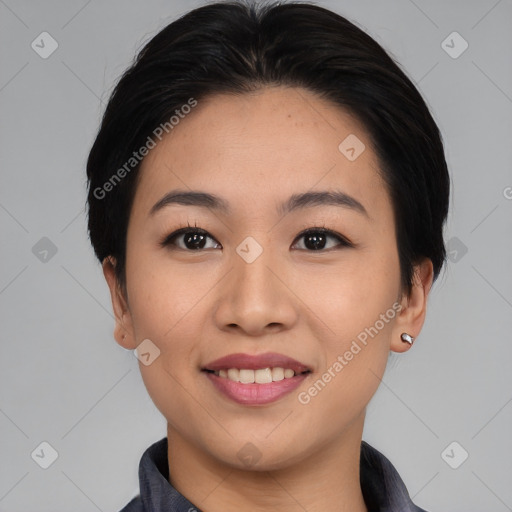 Joyful asian young-adult female with medium  black hair and brown eyes