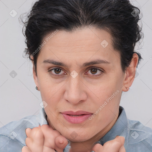 Joyful white adult female with short  brown hair and brown eyes