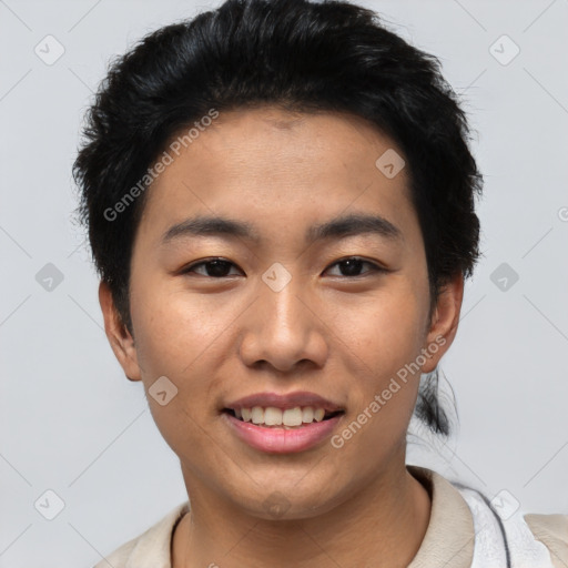 Joyful asian young-adult male with short  black hair and brown eyes
