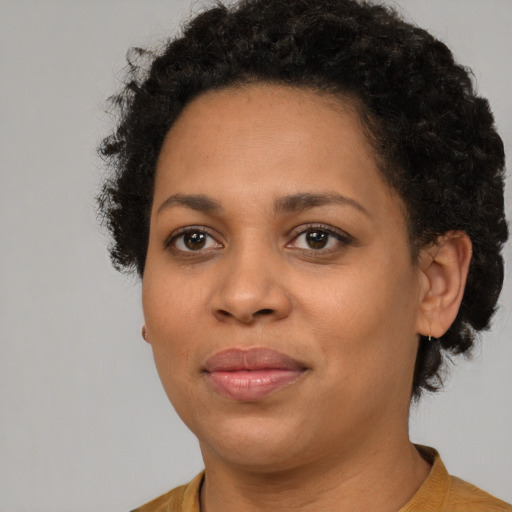 Neutral black young-adult female with short  brown hair and brown eyes