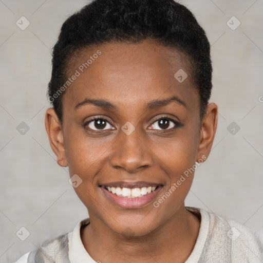 Joyful black young-adult female with short  brown hair and brown eyes