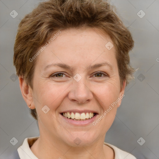 Joyful white adult female with short  brown hair and brown eyes