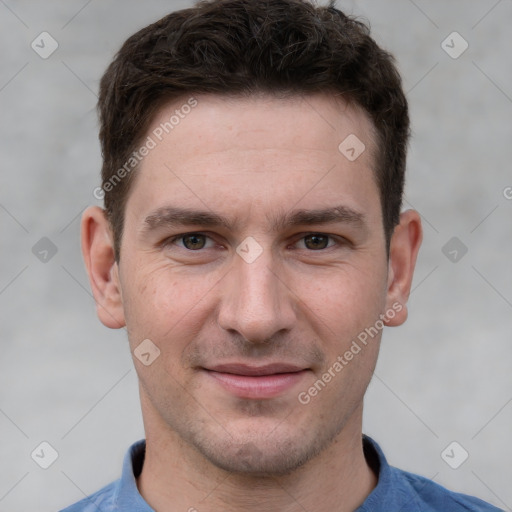 Joyful white adult male with short  brown hair and grey eyes