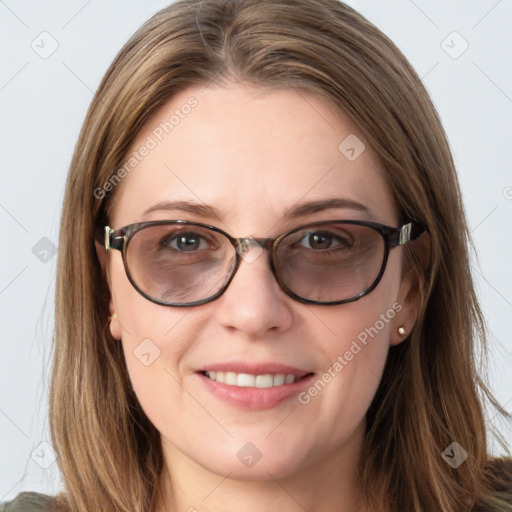 Joyful white young-adult female with long  brown hair and blue eyes