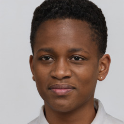 Joyful black young-adult male with short  brown hair and brown eyes