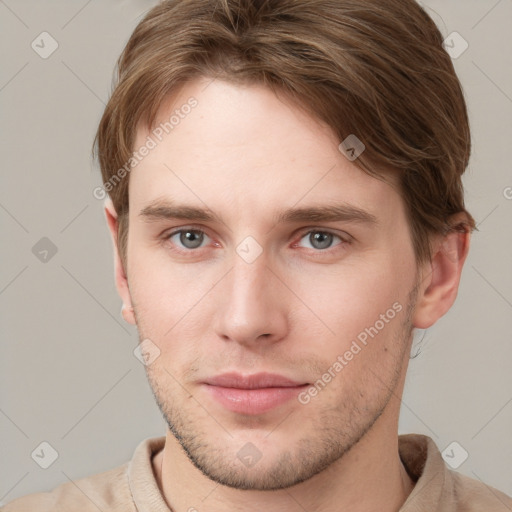 Neutral white young-adult male with short  brown hair and grey eyes