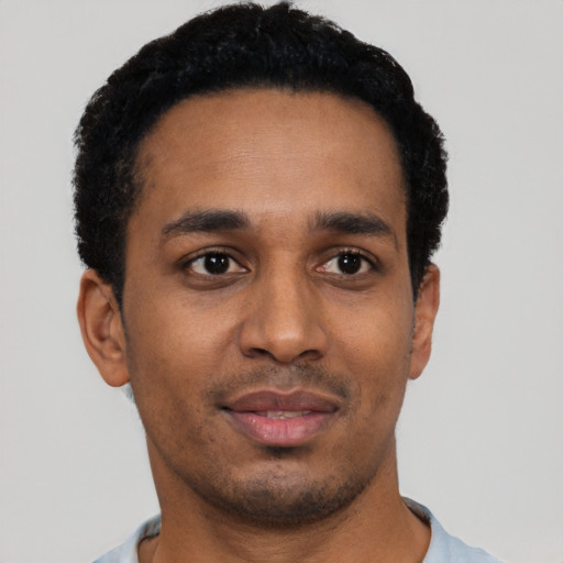 Neutral black young-adult male with short  black hair and brown eyes