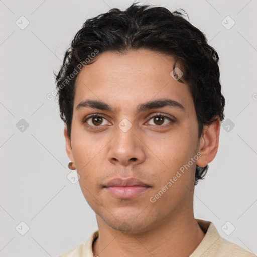 Neutral latino young-adult male with short  brown hair and brown eyes