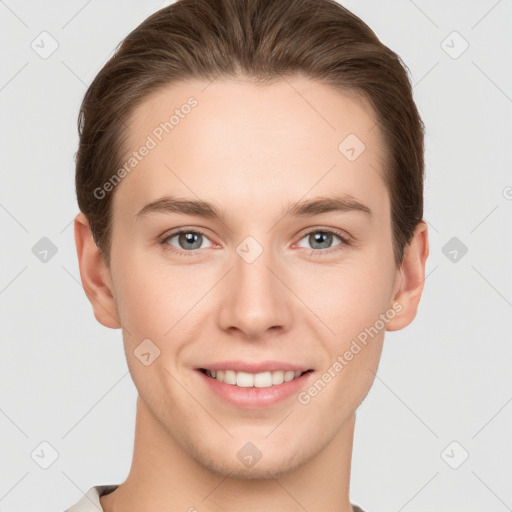 Joyful white young-adult female with short  brown hair and grey eyes