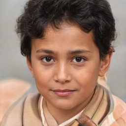 Joyful white child male with short  brown hair and brown eyes