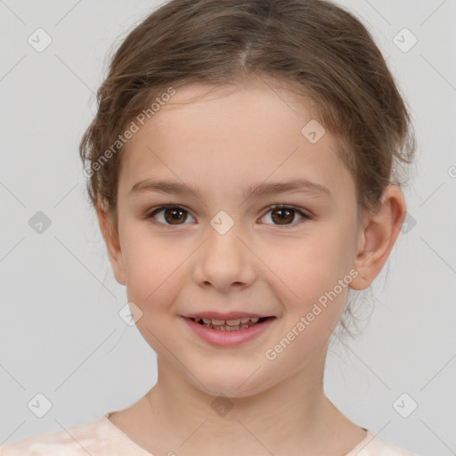 Joyful white child female with short  brown hair and brown eyes