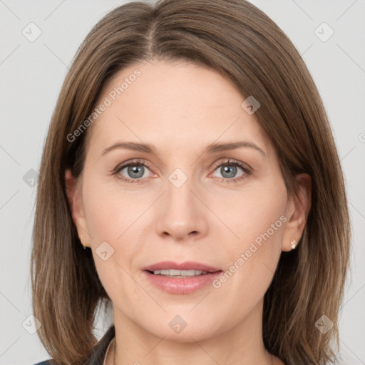 Joyful white adult female with medium  brown hair and grey eyes