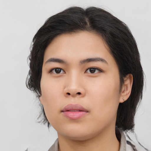 Neutral asian young-adult female with medium  brown hair and brown eyes