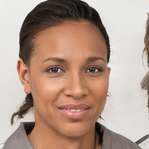 Joyful white young-adult female with medium  brown hair and brown eyes