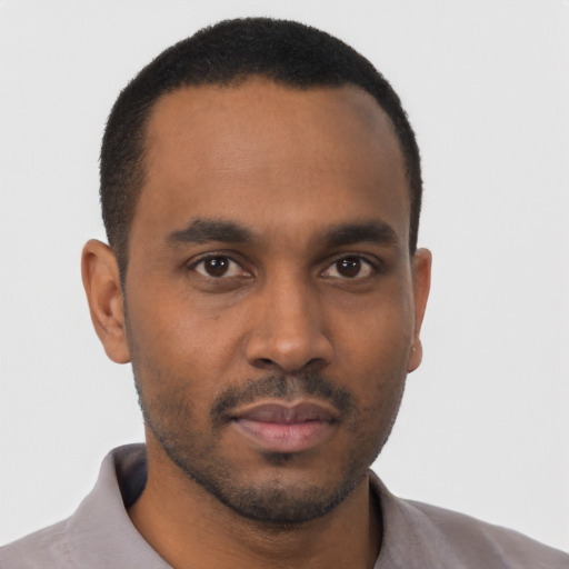 Neutral black young-adult male with short  black hair and brown eyes