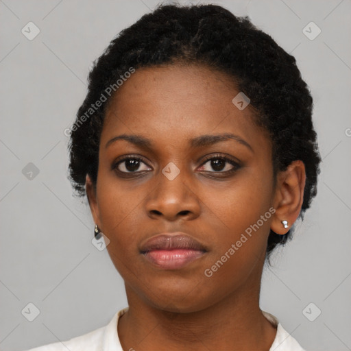 Neutral black young-adult female with short  black hair and brown eyes