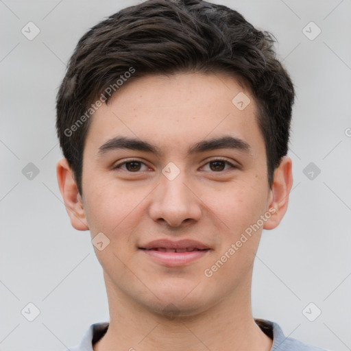 Joyful white young-adult male with short  brown hair and brown eyes