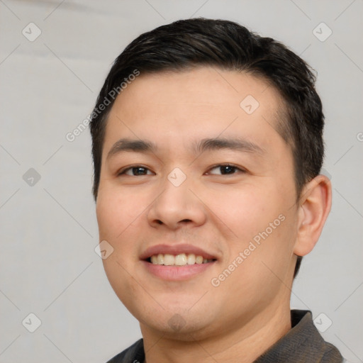 Joyful white young-adult male with short  black hair and brown eyes