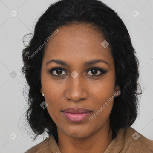Joyful black young-adult female with long  black hair and brown eyes