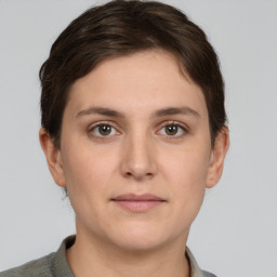 Neutral white young-adult female with short  brown hair and brown eyes