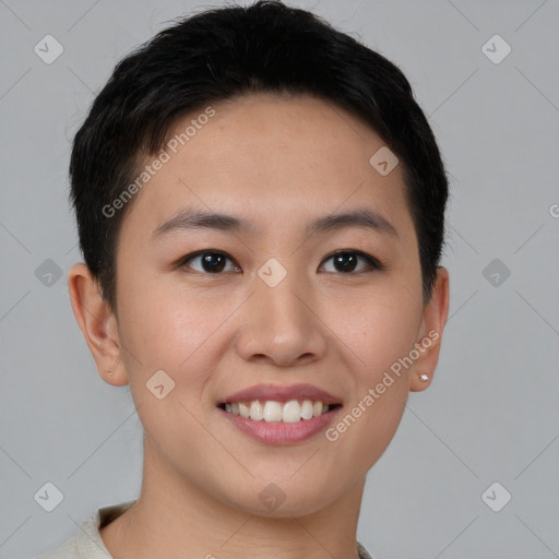 Joyful asian young-adult female with short  brown hair and brown eyes