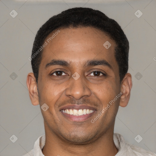 Joyful latino young-adult male with short  black hair and brown eyes