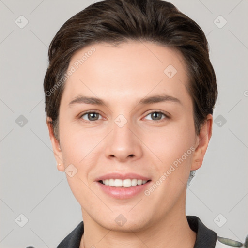 Joyful white young-adult female with short  brown hair and brown eyes