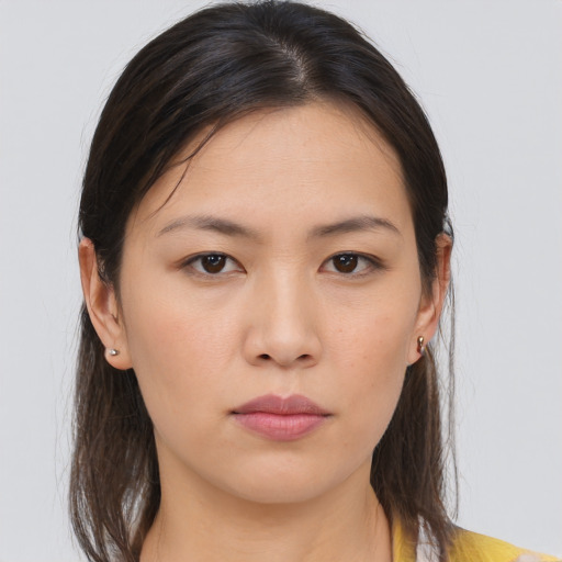 Neutral asian young-adult female with medium  brown hair and brown eyes