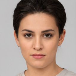 Neutral white young-adult female with short  brown hair and brown eyes