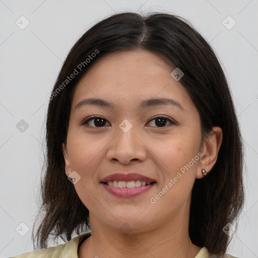 Joyful asian young-adult female with medium  brown hair and brown eyes