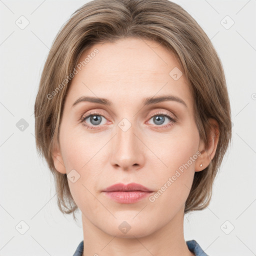 Neutral white young-adult female with medium  brown hair and grey eyes