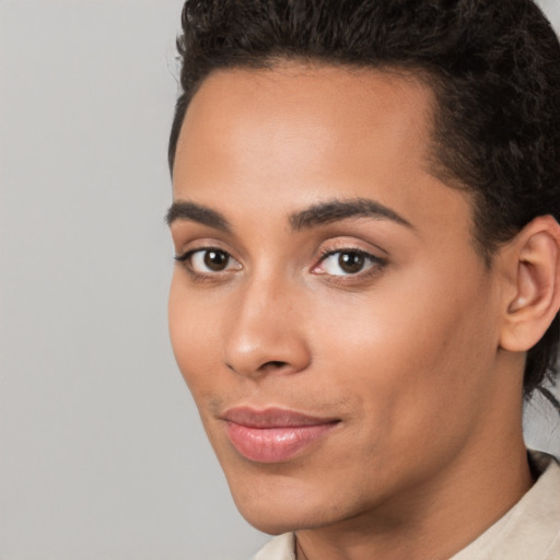 Joyful white young-adult female with short  black hair and brown eyes