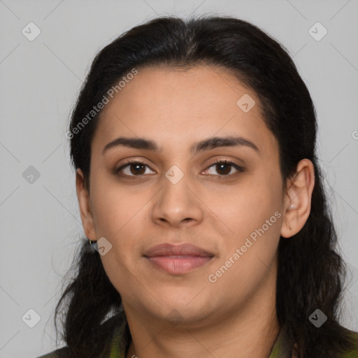 Joyful latino young-adult female with long  black hair and brown eyes