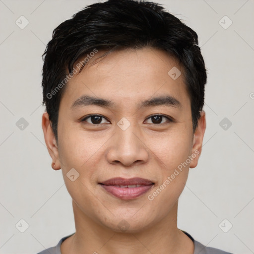 Joyful white young-adult male with short  black hair and brown eyes