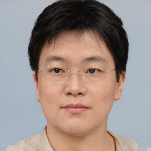 Neutral asian young-adult male with short  brown hair and brown eyes