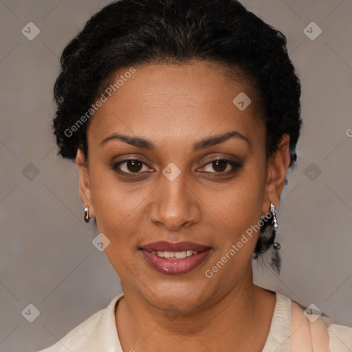 Joyful black young-adult female with short  brown hair and brown eyes