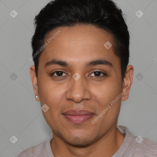 Joyful latino young-adult male with short  black hair and brown eyes