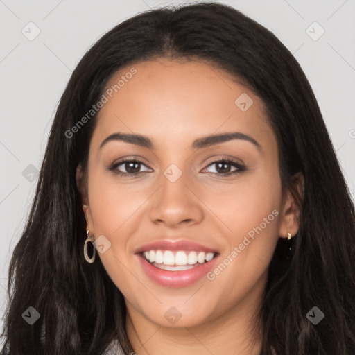 Joyful latino young-adult female with long  black hair and brown eyes