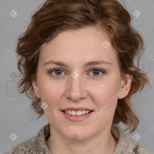 Joyful white young-adult female with medium  brown hair and blue eyes