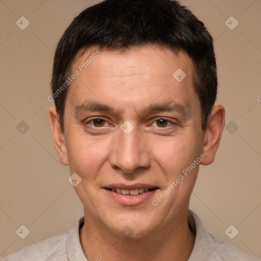 Joyful white adult male with short  brown hair and brown eyes